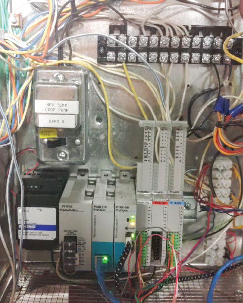 Figure 1. An industrialized open-source and Arduino-compatible CPU interoperates with PLC I/O modules and various Arduino “shields.” (Shown: AutomationDirect ProductivityOpen P1AM-100)