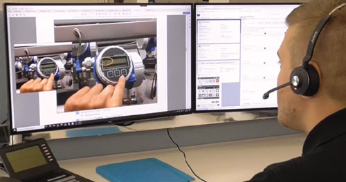 Figure 1. Using an augmented reality application, support engineers can see everything the technician sees in the field, and then guide troubleshooting or maintenance efforts using a virtual pencil to highlight target components for the technician.